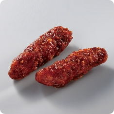 鶏ささみ肉を食べやすいスティック状にカットし、食感の軽いパン粉で衣付けしたチキンカツです。揚げた後に特製濃厚ソースを絡めました。ソースの染みこんだ衣が後引くおいしさです。自然解凍するだけでお使いいただけます。